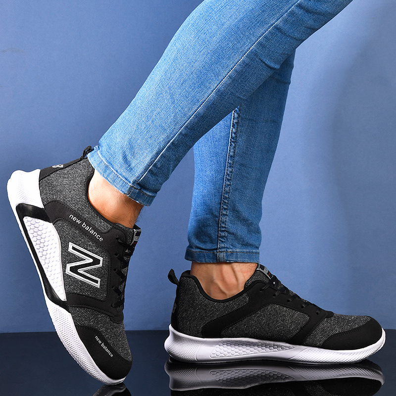 خرید اینترنتی کفش اسپرت کتانی پسرانه مدل New Balance خاکستری جدید 