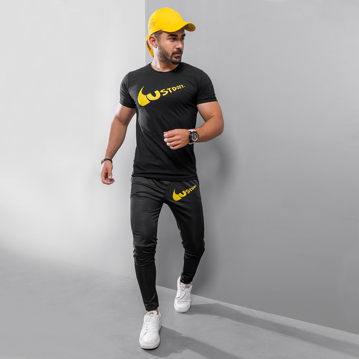 خرید اینترنتی ست تیشرت شلوار اسلش مردانه مشکی با طرح زرد