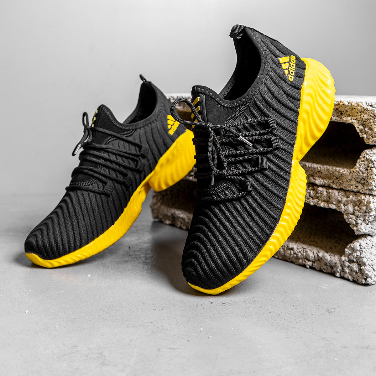 خرید کفش کتانی مشکی زرد مردانه آدیداس 2021