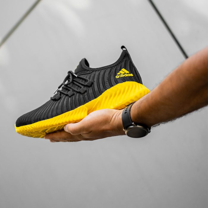 کفش اسپرت مردانه Adidas مشکی زرد طرح کتونی ورزشی