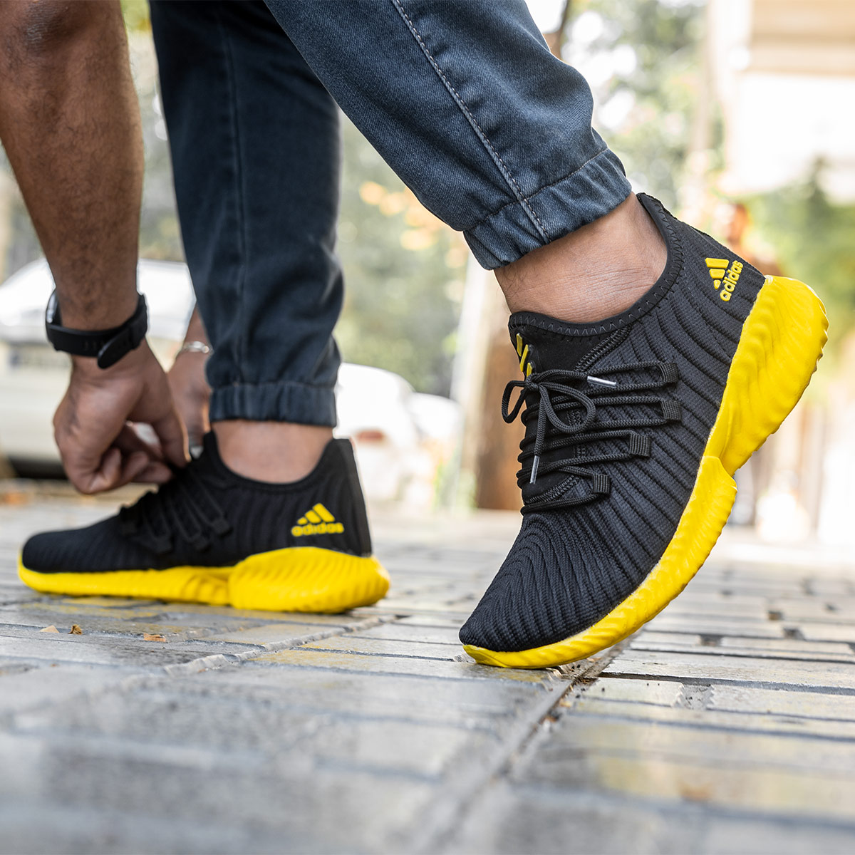 خرید کفش کتانی مشکی زرد مردانه آدیداس 2021