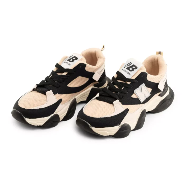 کفش کتانی دخترانه رنگ مشکی کرم از برند New Balance